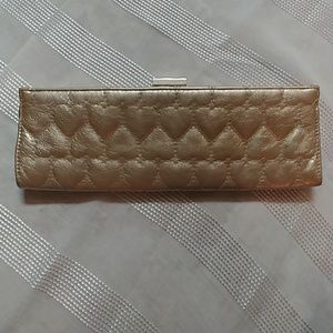 Small gold clutch